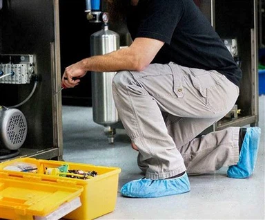 Endurnýjanlegt skref í skóhlífum